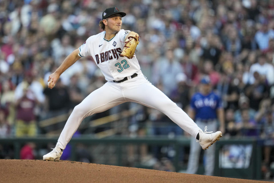 Arizona Diamondbacks starting pitcher Brandon Pfaadt throws against the Texas Rangers during the first inning in Game 3 of the baseball World Series Monday, Oct. 30, 2023, in Phoenix. (AP Photo/Godofredo A. Vásquez)