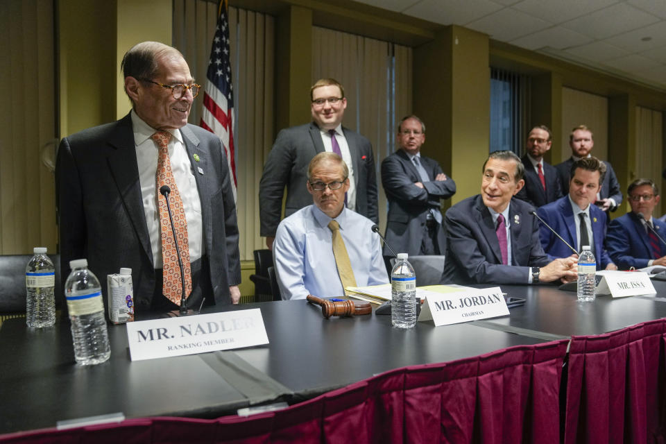Rep. Jerry Nadler, D-N.Y., left, takes his seat alongside House Judiciary Committee Chair Jim Jordan, R-Ohio, center, before a House Judiciary Committee Field Hearing, Monday, April 17, 2023, in New York. Republicans upset with Donald Trump's indictment are escalating their war on the prosecutor who charged him, trying to embarrass him on his home turf. (AP Photo/John Minchillo)