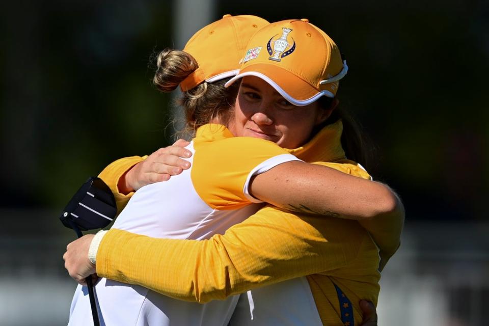 Leona Maguire (right) and Mel Reid celebrate their win against the USA in Sunday’s foursomes in the 17th Solheim Cup (David Dermer/AP) (AP)