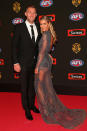 Pies forward Travis Cloke and partner Rebeccah Panozza.