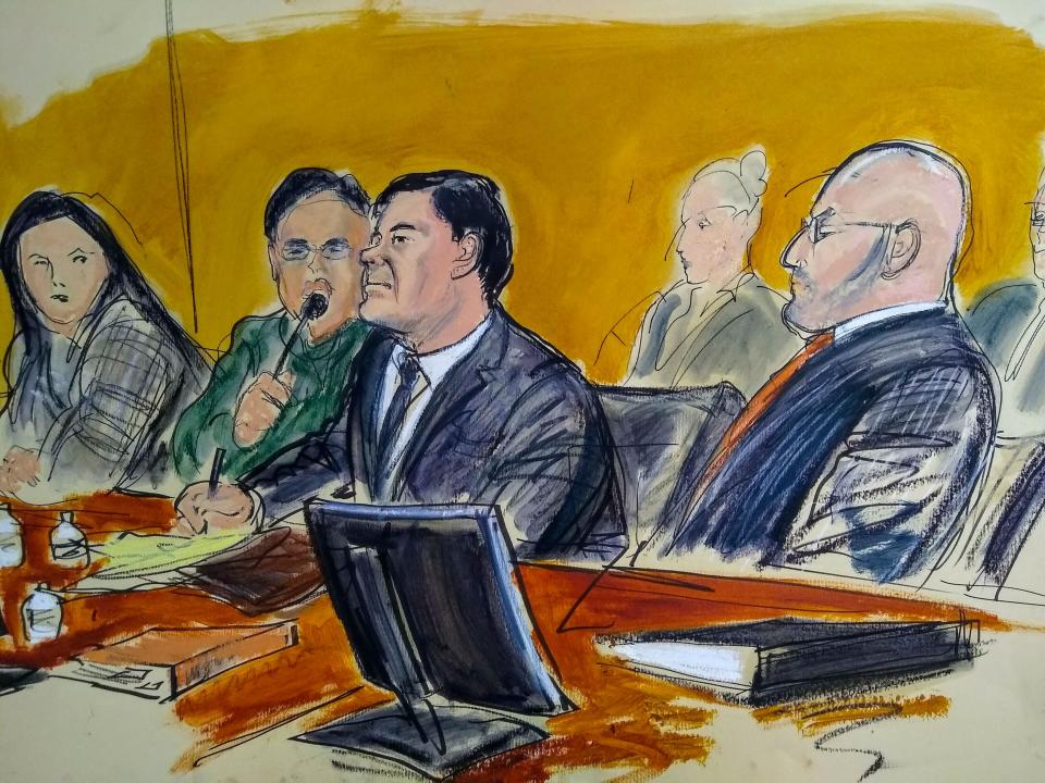 In this courtroom sketch, Joaquin "El Chapo" Guzman, center, and his attorney Eduardo Balazero, right, listen as a prosecutor delivers closing arguments during his trial, Wednesday, Jan. 30, 2019, in Brooklyn, NY.