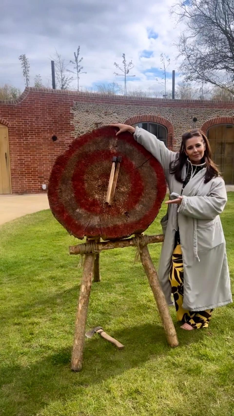 Cheryl tried her hand at axe throwing during her birthday weekend away (Instagram/ cherylofficial)