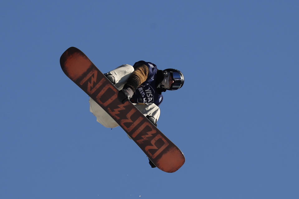 A snowboarder practices for the Big Air Atlanta snowboard and ski competition at SunTrust Park Thursday, Dec. 19, 2019, in Atlanta. (AP Photo/John Bazemore)