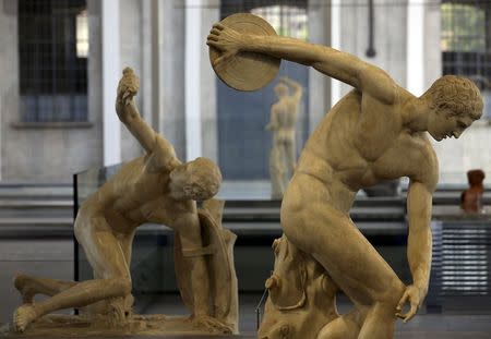 The "Discobolus" sculpture (R) is seen at the Prada Foundation in Milan, May 6, 2015. REUTERS/Stefano Rellandini