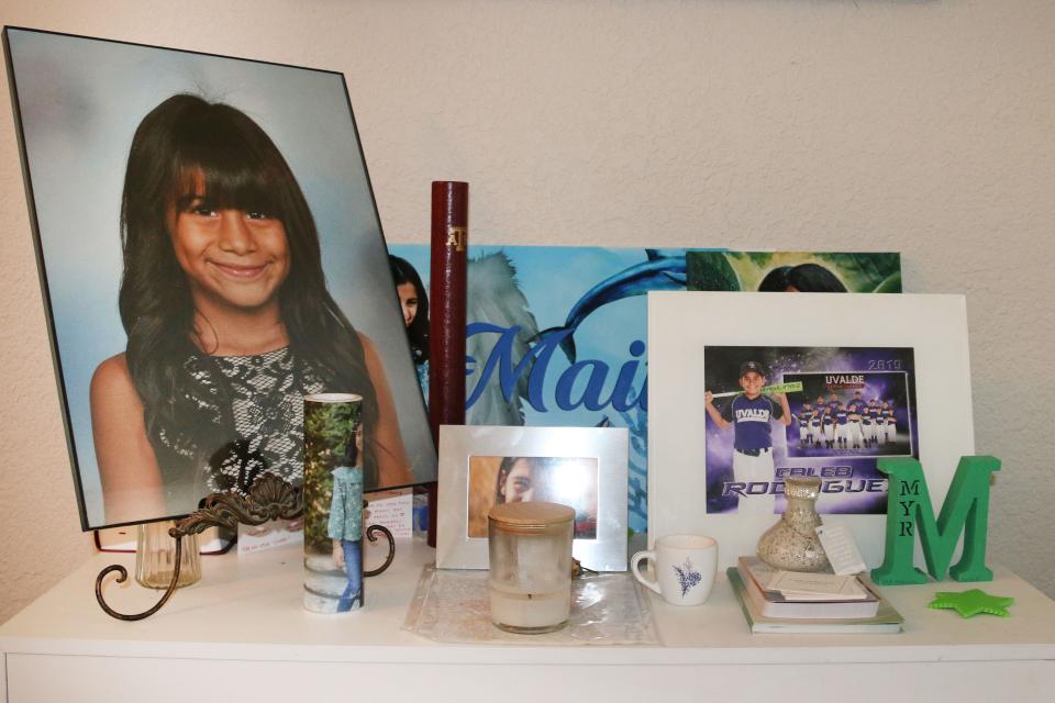 Photos and mementos of Robb Elementary shooting victim Maite Rodriguez are displayed at the home of her mother, Ana Rodriguez.