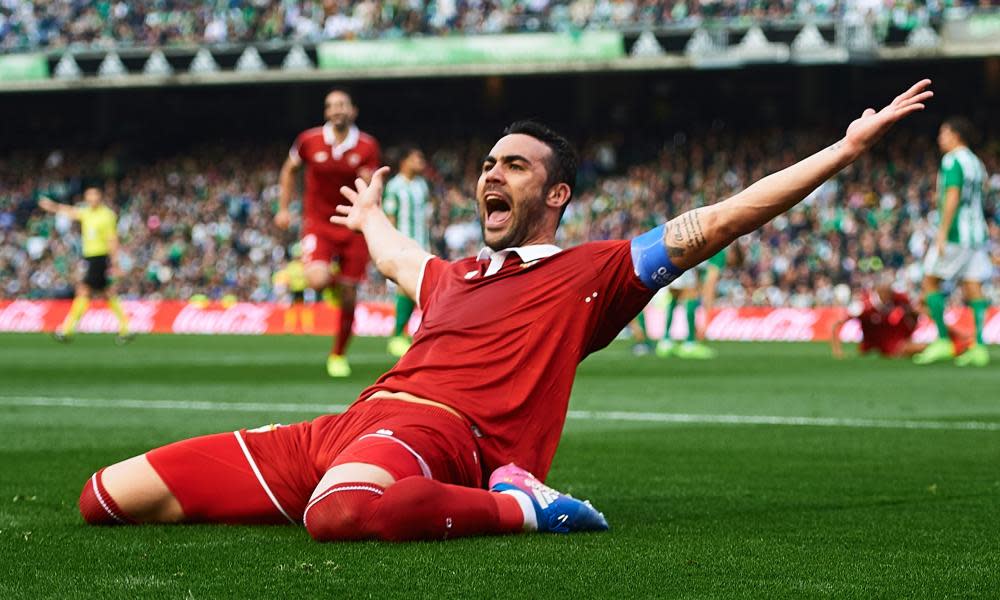 Vicente Iborra celebrates after scoring for Sevilla in their comeback win at Betis.