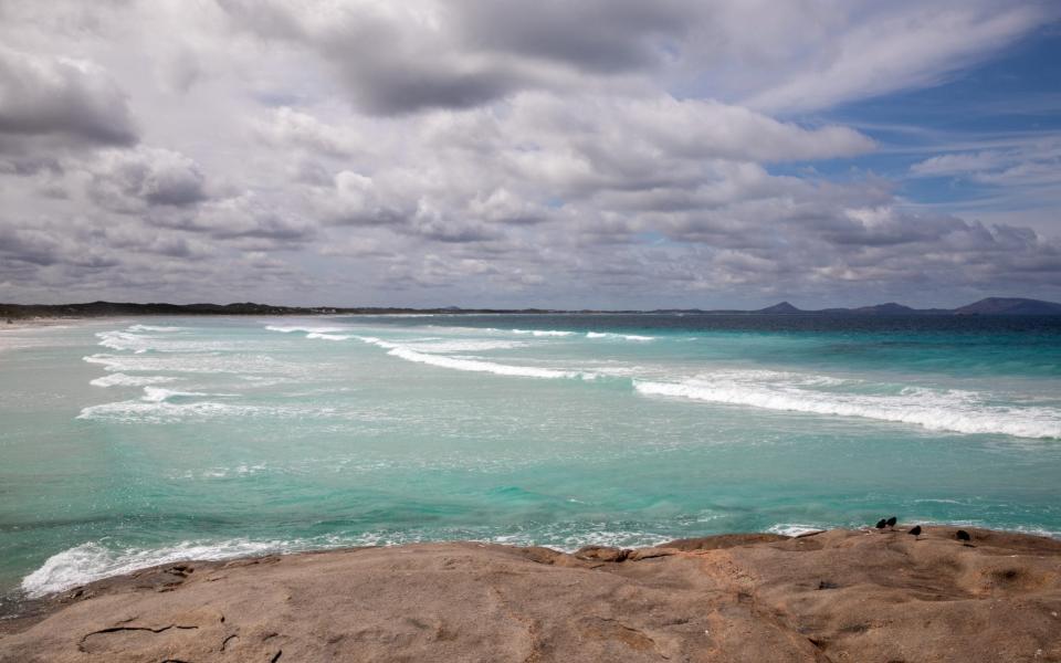 View towards popular surfing spot Kelp Beds beach at Wylie Bay, Esperance, now empty