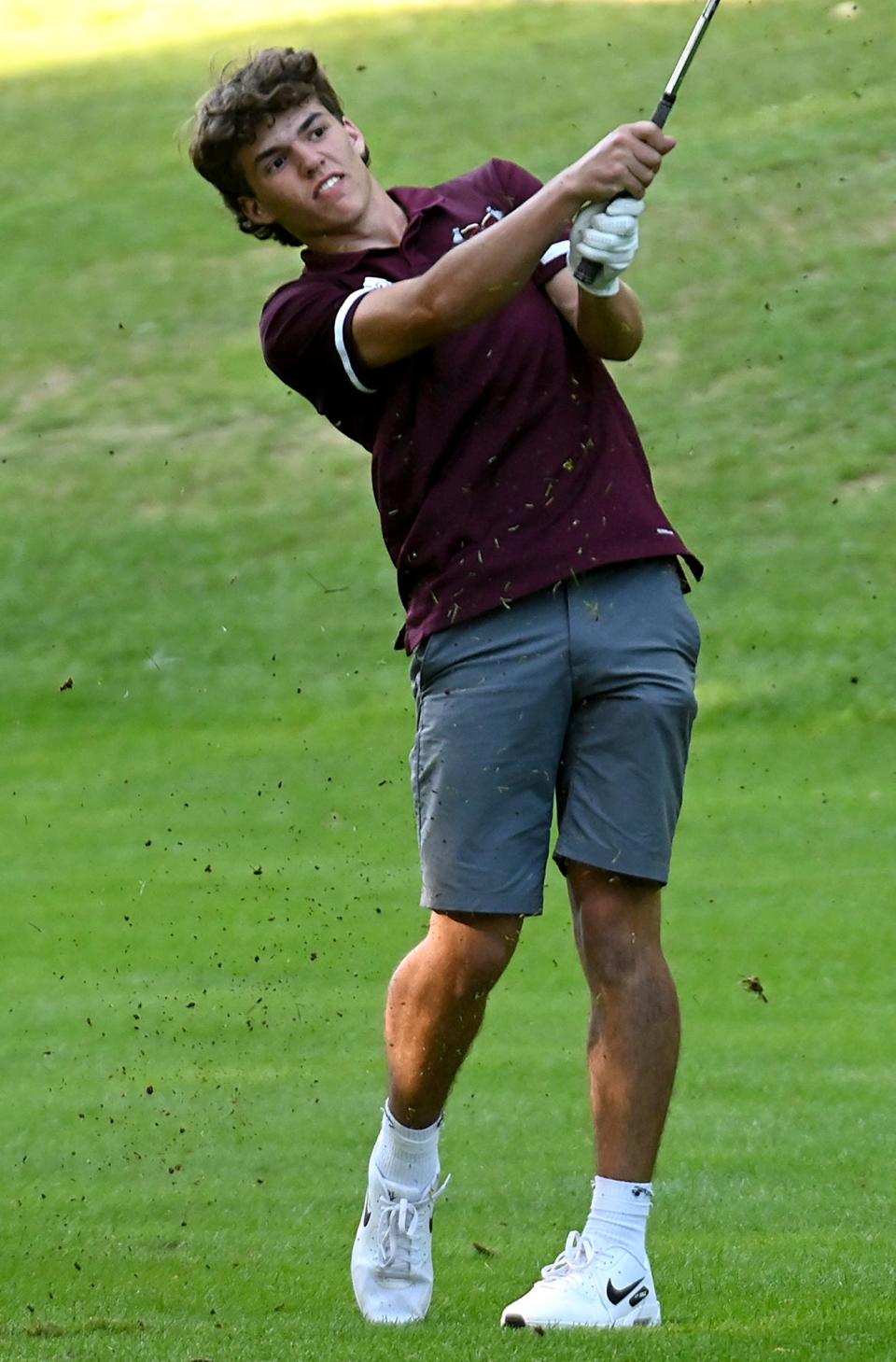 Algonquin golfer Brennan Rice kicks up some turf on a third hole drive during a match against Groton-Dunstable at Juniper Hill Golf Course in Northborough, Sept. 8, 2022.  