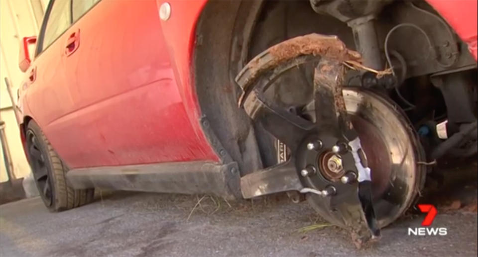 The badly damaged Subaru was dumped after the thieves crashed into a pole and fled on foot. Source: 7 News