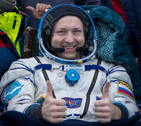 International Space Station crew member Alexander Misurkin of Russia rests after the Soyuz MS-06 capsule landed in a remote area outside the town of Dzhezkazgan (Zhezkazgan), Kazakhstan, on February 28, 2018. Bill Ingalls/NASA/Handout via Reuters