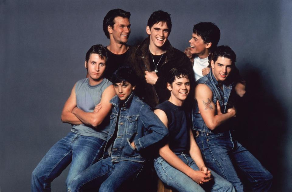 PHOTO: Patrick Swayze, Matt Dillon, Rob Lowe, Emilio Estevez, Ralph Macchio, Thomas C. Howell, and Tom Cruise pose on the set of the 1983 film 'The Outsiders,' directed by Francis Ford Coppola.  (Sunset Boulevard/Corbis via Getty Images, FILE)
