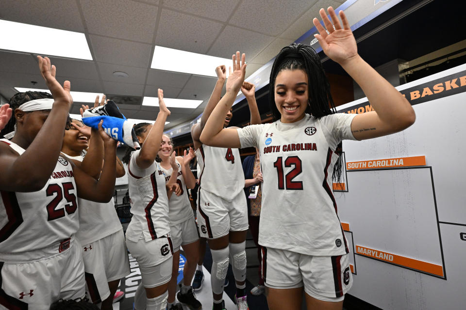 Brea Beal and the South Carolina Gamecocks celebrate after updating the bracket following their win over UCLA during the Sweet 16 round of the NCAA women's tournament at Bon Secours Wellness Arena in Greenville, South Carolina, on March 25, 2023. (Grant Halverson/NCAA Photos via Getty Images)