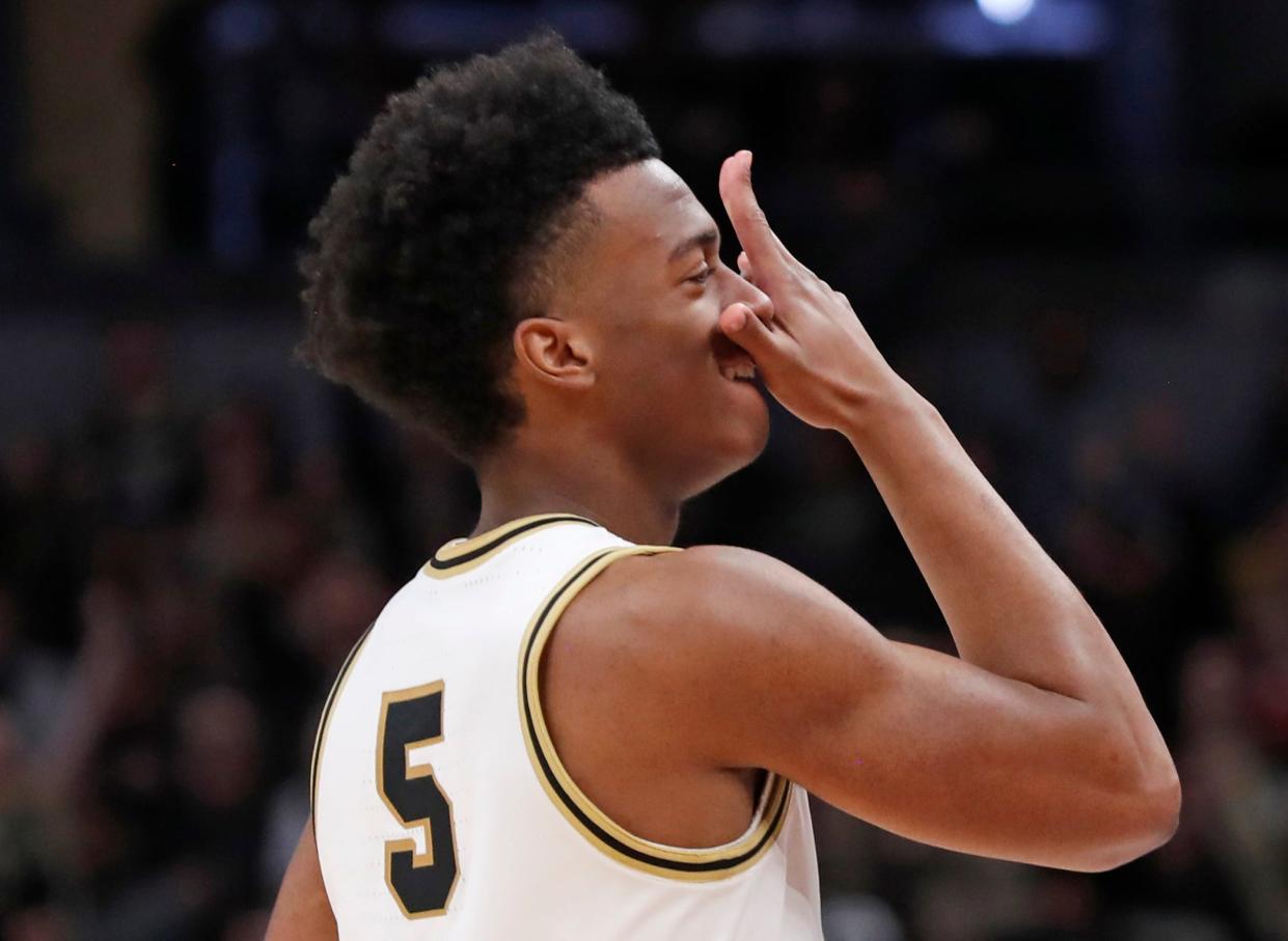 Purdue Boilermakers guard Myles Colvin (5) reacts after scoring during NCAA Men’s Basketball Tournament game Utah State Aggies, Sunday, March 24, 2024, at Gainbridge Fieldhouse in Indianapolis. Purdue Boilermakers won 106-67.