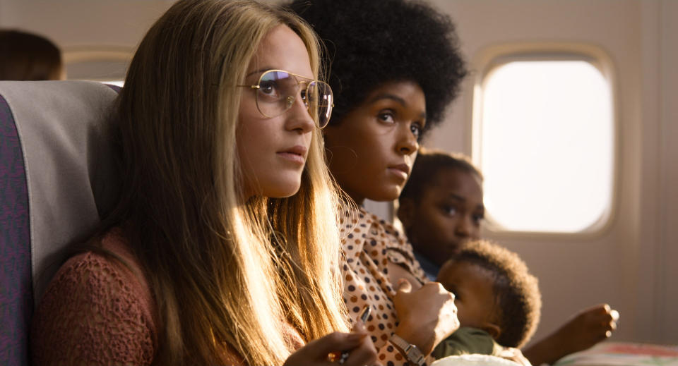 This image released by LD Entertainment and Roadside Attractions shows Alicia Vikander as Gloria Steinem, left, and Janelle Monae as Dorothy Pitman Hughes in a scene from "The Glorias," premiering Wednesday on Amazon Prime. (LD Entertainment and Roadside Attractions via AP)