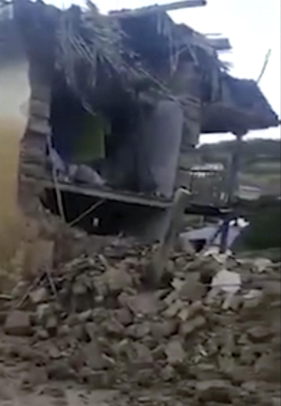 In this grab taken from video a view of a destroyed house after an earthquake, in Bagua Grande, Peru, Sunday, Nov. 28, 2021. The U.S. Geological Survey says a strong earthquake with a preliminary magnitude of 7.5 has struck in northern Peru. (AP)
