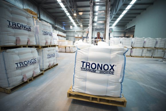 Pallets containing bags of Tronox-branded titanium dioxide pigment.