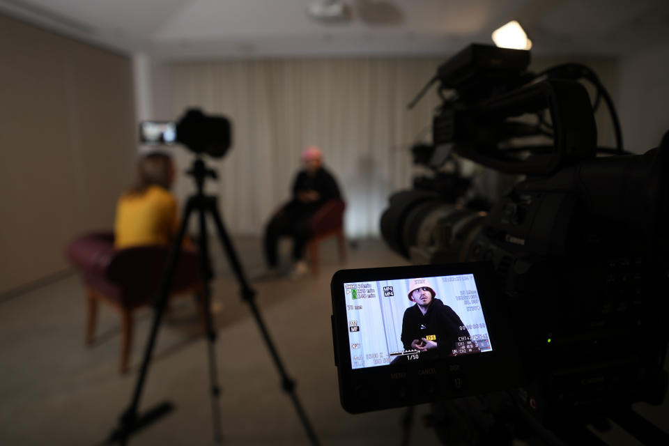 Oleh Psiuk, frontman of Ukraine's Kalush Orchestra talks during an interview in Turin, Italy, Thursday May 5, 2022. Ukrainian band Kalush Orchestra’s upbeat, melodic entry to this month’s Eurovision Song Contest was written as a tribute to the frontman’s mother. But since the Russian invasion of Ukraine, the song called “Stefania” has become an anthem to the country's war-ravaged motherland. (AP Photo/Antonio Calanni)