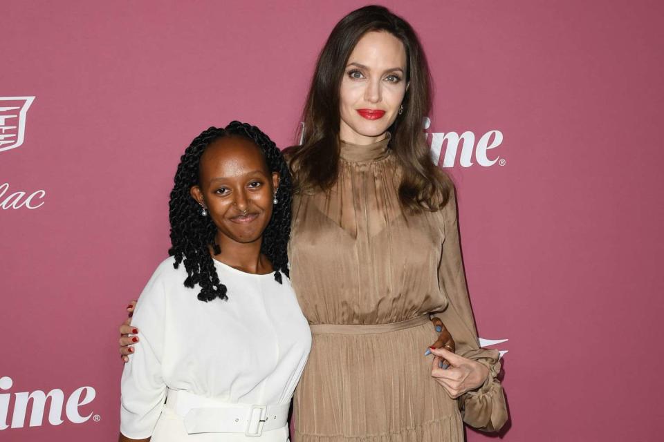 Jon Kopaloff/WireImage Zahara Jolie-Pitt and Angelina Jolie attend Variety