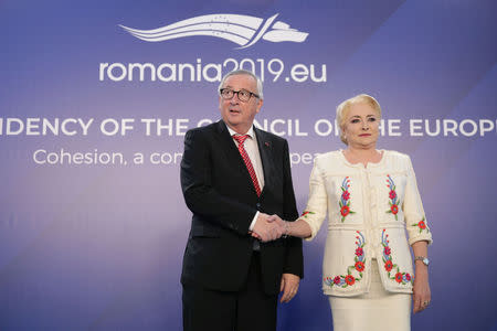 Romanian Prime Minister Viorica Dancila and European Commission President Jean-Claude Juncker pose for a picture in Bucharest, Romania, January 11, 2019. Inquam Photos/Octav Ganea via REUTERS ATTENTION EDITORS - THIS IMAGE WAS PROVIDED BY A THIRD PARTY. ROMANIA OUT.