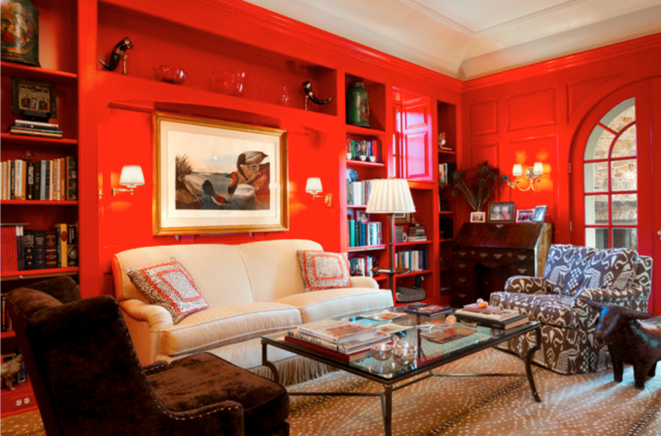 living room with bright red walls