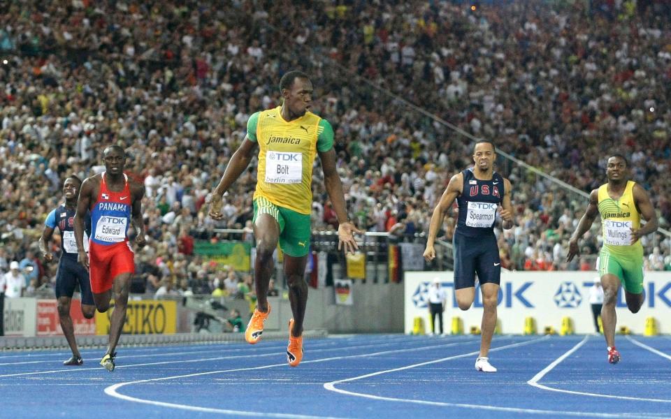 Bolt of Jamaica sets world record in winning men's 200 meters final during the world athletics championships at the Olympic stadium in Berlin