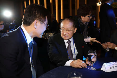 North Korean Ri Jong-hyok, vice chairman of the Korean Asia-Pacific Peace Committee, talks with Lee Jae-myung, Gyeonggi province governor during the international convention for peace and prosperity in the Asia-Pacific, in Goyang, South Korea November 16, 2018. Chung Sung-Jun/Pool via Reuters