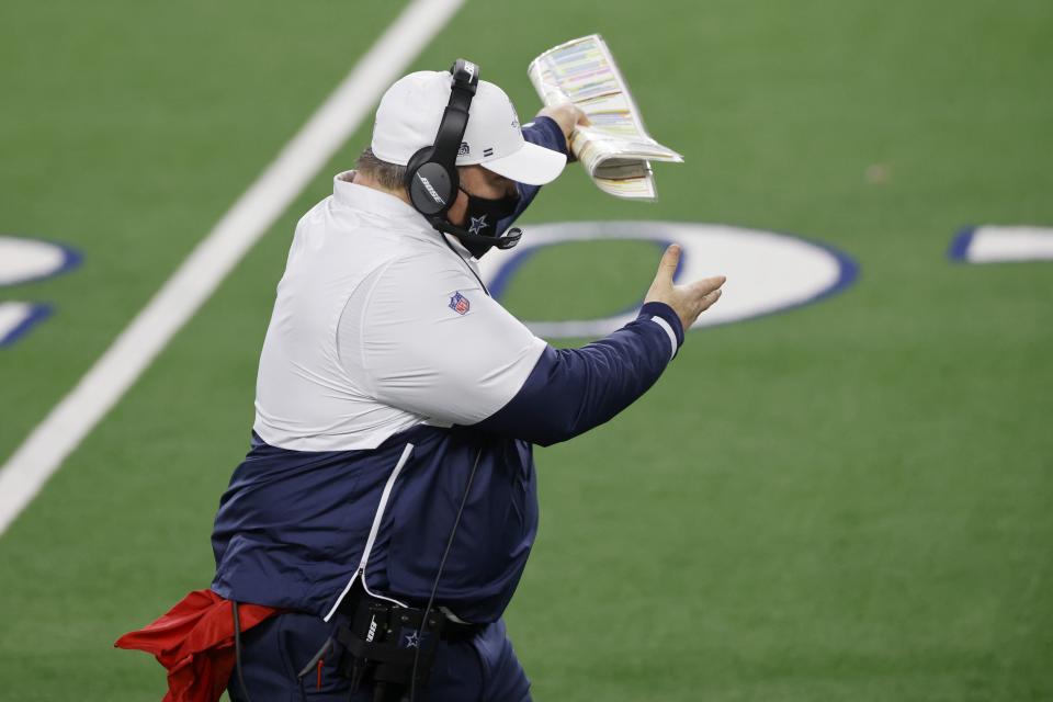 Dallas Cowboys coach Mike McCarthy gestures as he walks along the sideline in the second half of an NFL football game against the Washington Football Team in Arlington, Texas, Thursday, Nov. 26, 2020. (AP Photo/Ron Jenkins)