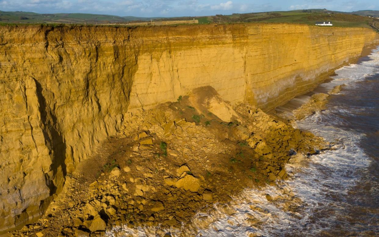 Aerial photos show boulders the size of double-decker buses resting on top of a 50ft pile of debris