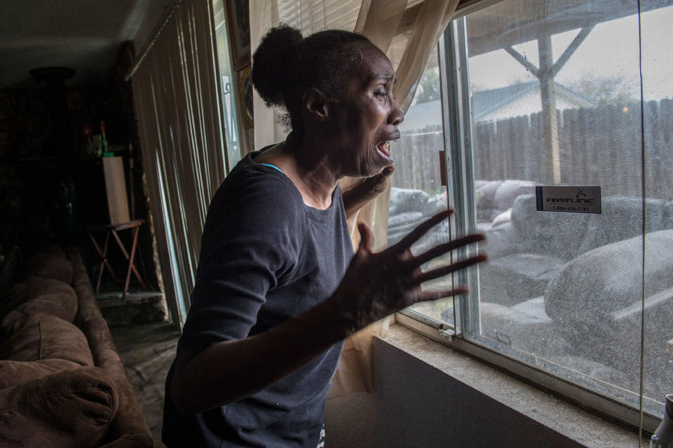 <p>Sequita Thompson recounts the horror of seeing her grandson, Stephon Clark, dead in her backyard after he was shot by police, in Sacramento. Calif., on March 20, 2016. (Photo: Renée C. Byer/The Sacramento Bee via ZUMA Wire) </p>