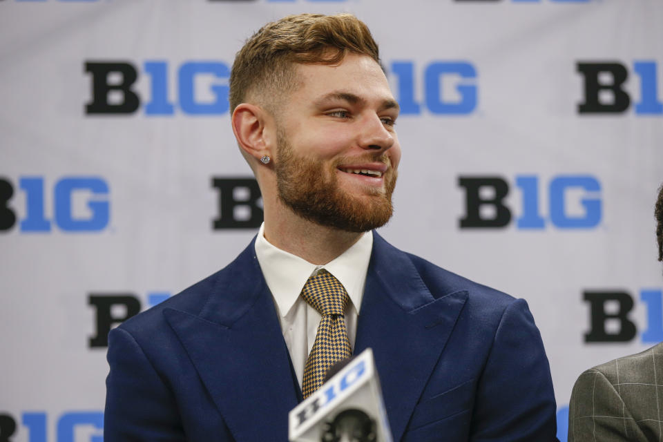 Michigan player Hunter Dickinson speaks during Big Ten NCAA college basketball Media Days Wednesday, Oct. 12, 2022, in Minneapolis. (AP Photo/Bruce Kluckhohn)