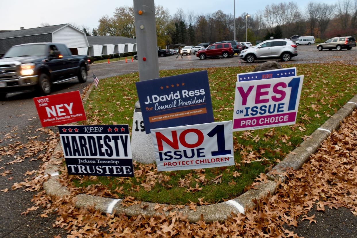 Vehicles stream in and out of St. John Lutheran Church in Massillon, which served as a polling location Tuesday.