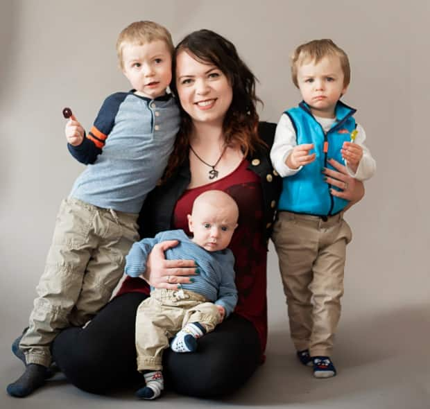 Paige Atherton distracts herself with quality time with her sons as she waits for her surgery appointment. 