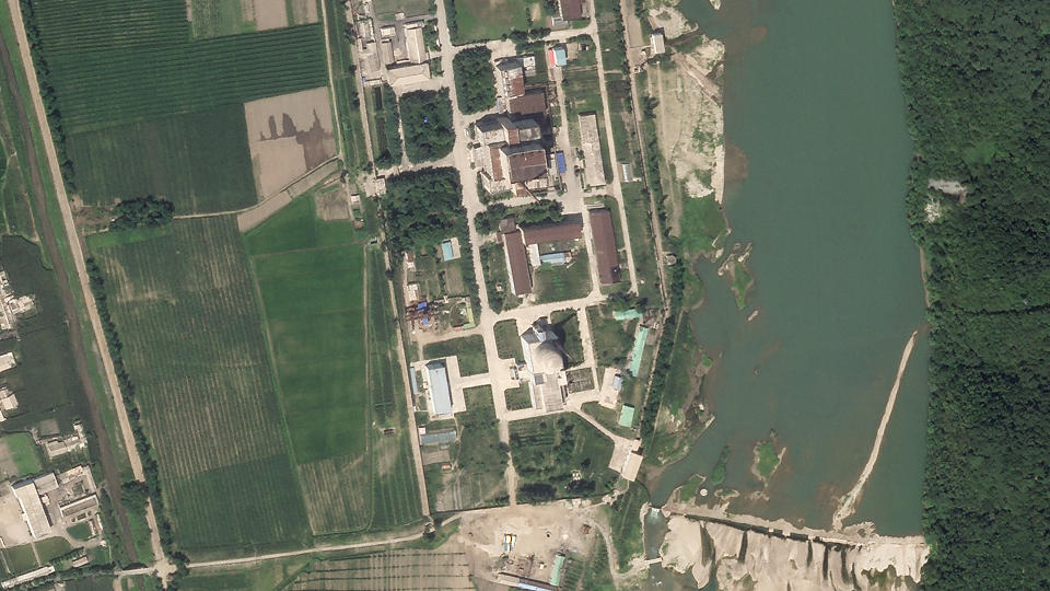In this satellite photo released by Planet Labs Inc., North Korea's main nuclear complex is seen in Yongbyon, North Korea, just north of the capital, Pyongyang, July 27, 2021. North Korea appears to have restarted the operation of its main nuclear reactor used to produce weapons fuels, the U.N. atomic agency said, as the North openly threatens to enlarge its nuclear arsenal amid long-dormant nuclear diplomacy with the United States. In the image, North Korea's 5-megawatt nuclear reactor is seen to the building to the north, while the experimental light water reactor is the building with the circular feature atop it to the south. (Planet Labs Inc. via AP)