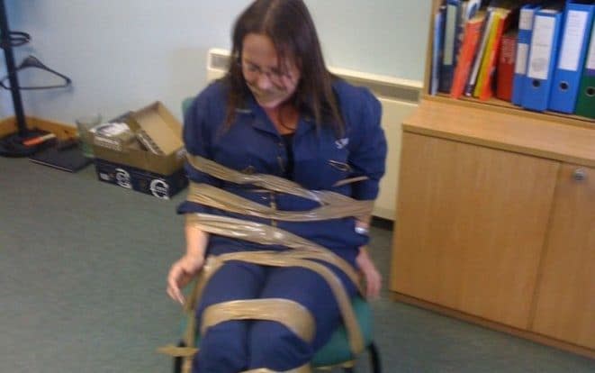 DeeAnn Fitzpatrick was allegedly taped to a chair by colleagues - BBC