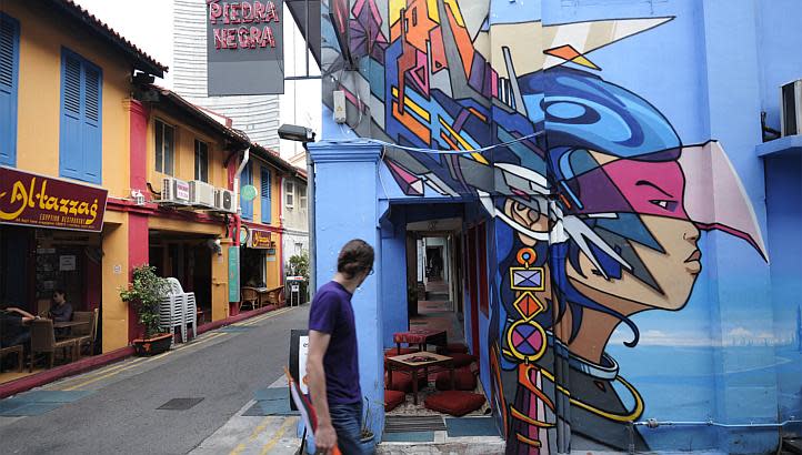 The artwork outside the Blu Jaz Cafe, commissioned by its owner Ms Aileen Tan, was among the street art deemed objectionable. (Image Credit: The Straits Times)