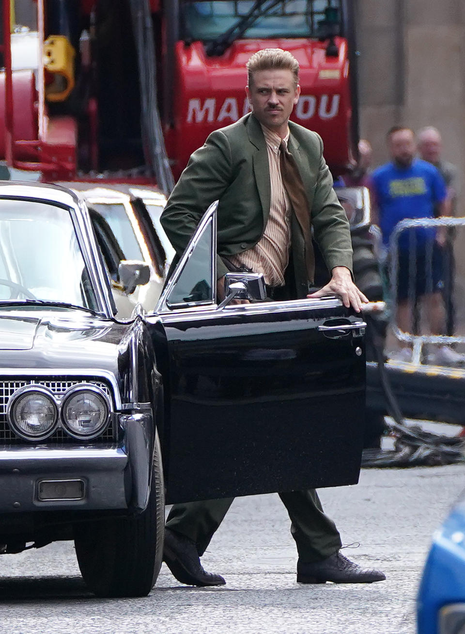 Actor Boyd Holbrook on Cochrane Street in Glasgow city centre during filming for what is thought to be the new Indiana Jones 5 movie starring Harrison Ford. Picture date: Wednesday July 14, 2021.