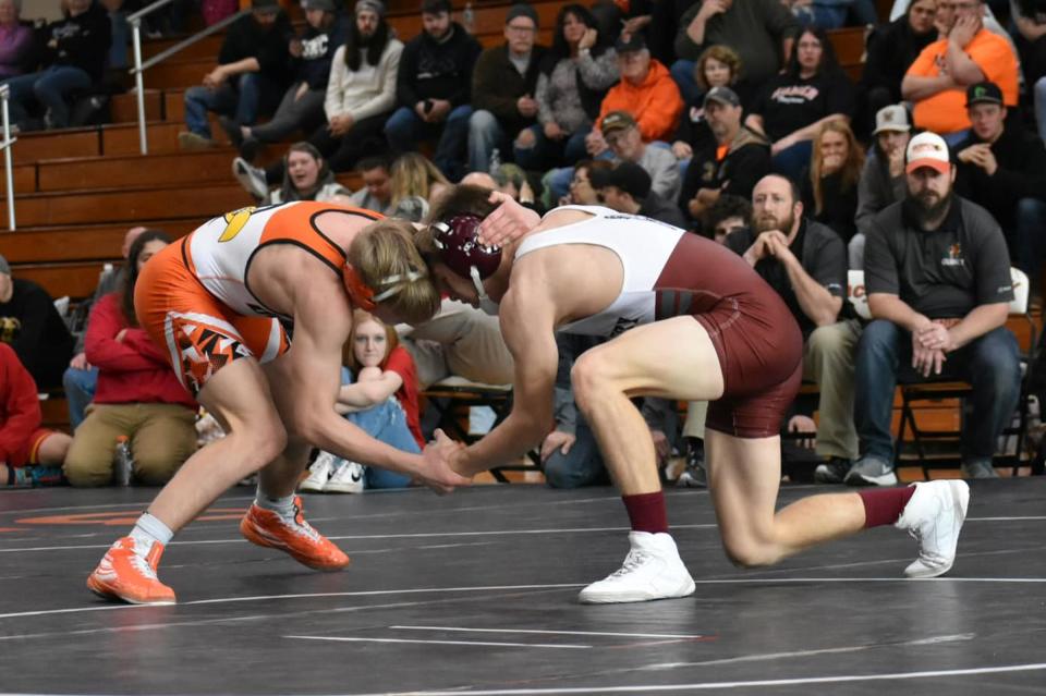 Union City's Landyn Crance (right) faces off with Quincy's Jacob Reif (left) in what could be deemed the match of the tournament. Crance went on to win 3-2 to claim the 126 pound weight class.