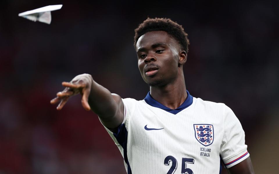 Bukayo Saka throws a paper aeroplane at Wembley against Iceland - England player ratings vs Iceland: Who should start Euro 2024 opener?