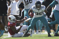 Jacksonville Jaguars wide receiver Jamal Agnew (39) gets away from Arizona Cardinals tight end Demetrius Harris (86) on his way to a 109-yard touchdown run on a missed field goal by the Arizona Cardinals during the first half of an NFL football game, Sunday, Sept. 26, 2021, in Jacksonville, Fla. (AP Photo/Phelan M. Ebenhack)