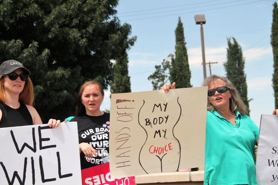 Protesters on the corner of 10th Street and White Sands Boulevard at the New Voices Otero protest about the City Of Alamogordo's August 2, 2022 resolution declaring Alamogordo a sanctuary for the unborn.