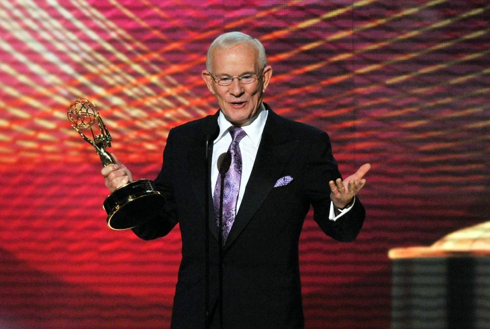 Tommy Smothers accepting an honorary Emmy in 2008 (Kevin Winter/Getty Images)