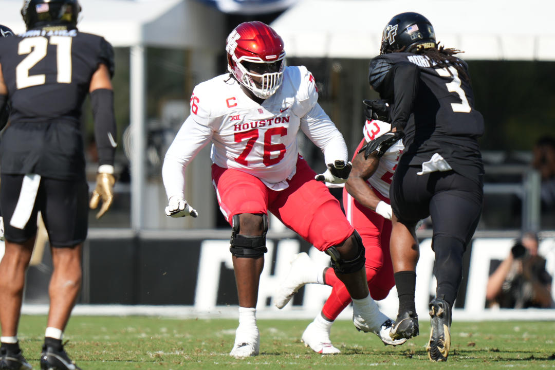 ORLANDO, FL - NOVEMBER 25: Houston Cougars offensive lineman Patrick Paul (76) protects the pocket during the game between the Houston Cougars and the Central Florida (UCF) Knights on Saturday, November 25, 2023 at FBC Mortgage Stadium, Orlando, Fla. (Photo by Peter Joneleit/Icon Sportswire via Getty Images)
