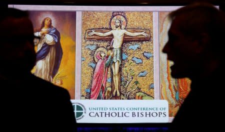 Attendees speak during a break at the United States Conference of Catholic Bishops (USCCB) general assembly in Baltimore, Maryland, U.S., November 12, 2018.  REUTERS/Kevin Lamarque