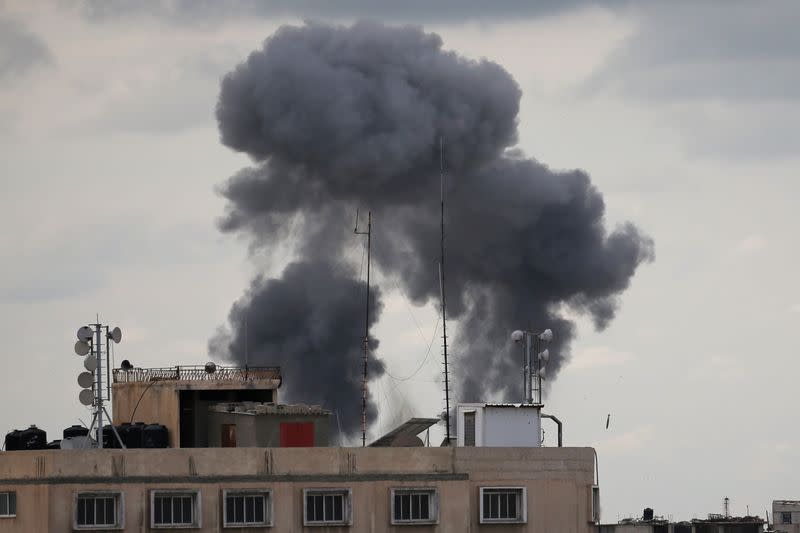 A missile is dropped on a target as smoke rises during an Israeli air strike in the southern Gaza Strip