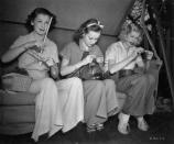 <p>One of Lucille's first big roles was playing Lillian Temple in <em>Chatterbox. </em>Here, she knits on set between scenes with fellow actresses Patricia Wilder and Anne Shirley.</p>