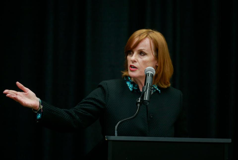 Laura Roan, a prosecutor and Democratic candidate for Polk County attorney, answers a question during the Polk County attorney candidate forum at the Olmsted Center at Drake University in Des Moines on Tuesday, May 24, 2022.