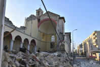 A view of the destroyed Catholic Church after the earthquake, in Iskenderun, southern Turkey, Thursday, Feb. 9, 2023. Thinly stretched rescue teams worked through the night in Turkey and Syria, pulling more bodies from the rubble of thousands of buildings toppled by a catastrophic earthquake. (Depo Photos via AP)