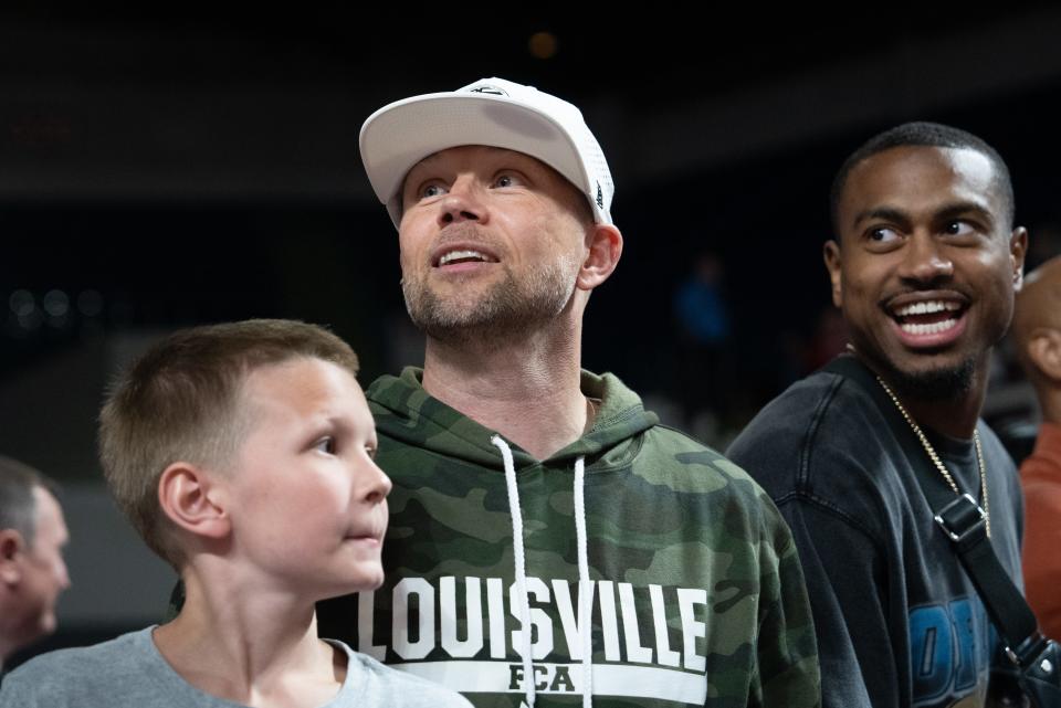 Louisville men’s basketball coach Pat Kelsey watches The Basketball Tournament’s second-round game between The Ville and Sideline Cancer on Monday night at Freedom Hall.