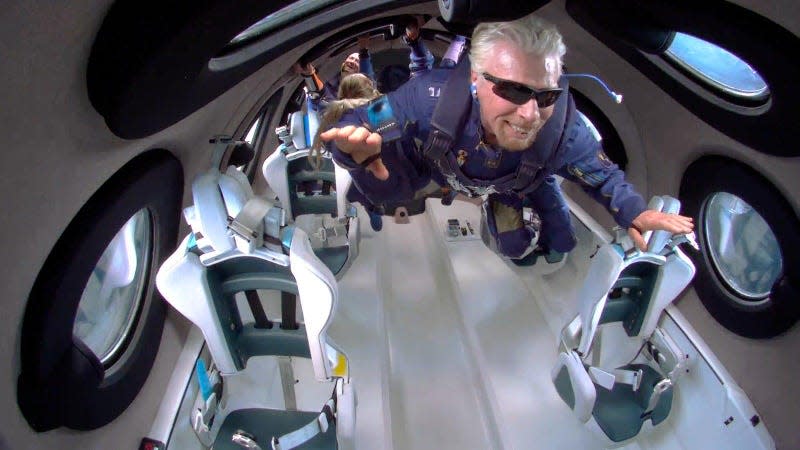 Richard Branson hovers in mid air during his Unity22 spaceplane test flight.