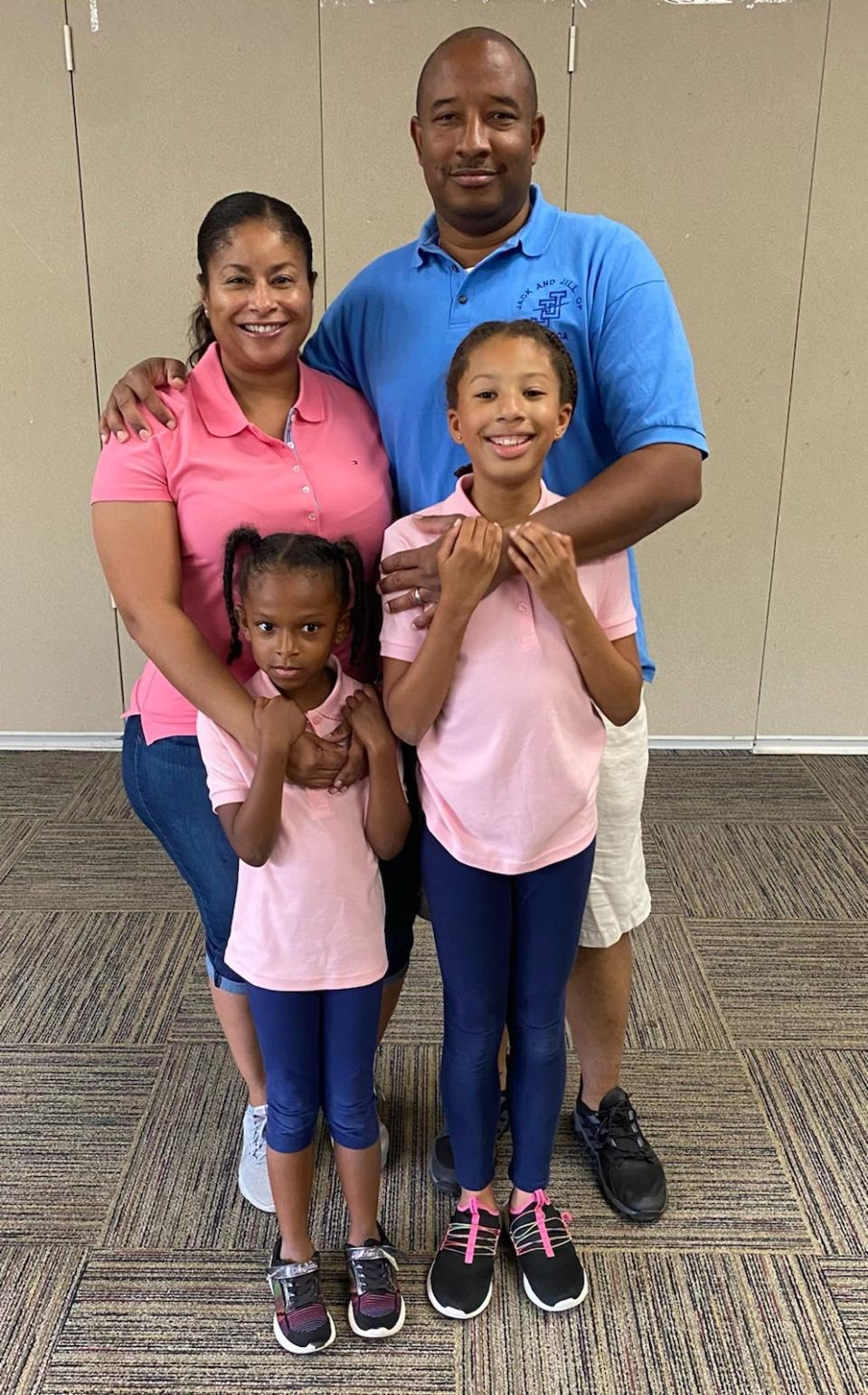 William "Will" Harris with his wife and two daughters